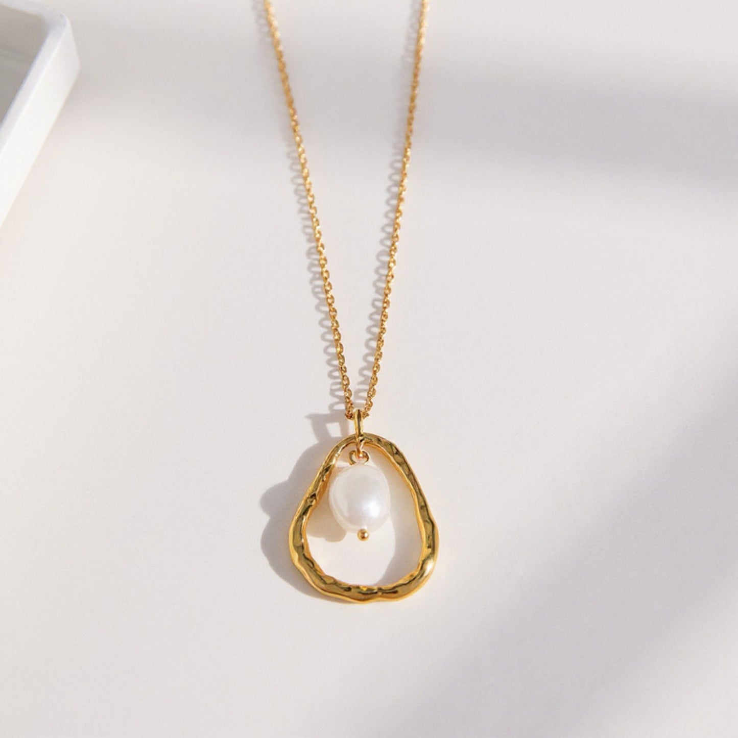 Textured Open Teardrop Pendant Necklace with Organic Hammered Frame and Dainty Suspended Faux Pearl Accent Charm