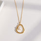 Textured Open Teardrop Pendant Necklace with Organic Hammered Frame and Dainty Suspended Faux Pearl Accent Charm