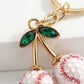 2 Pack Sports Ball Cherry Keychains with Gold Tone Clip and Leaf Charm