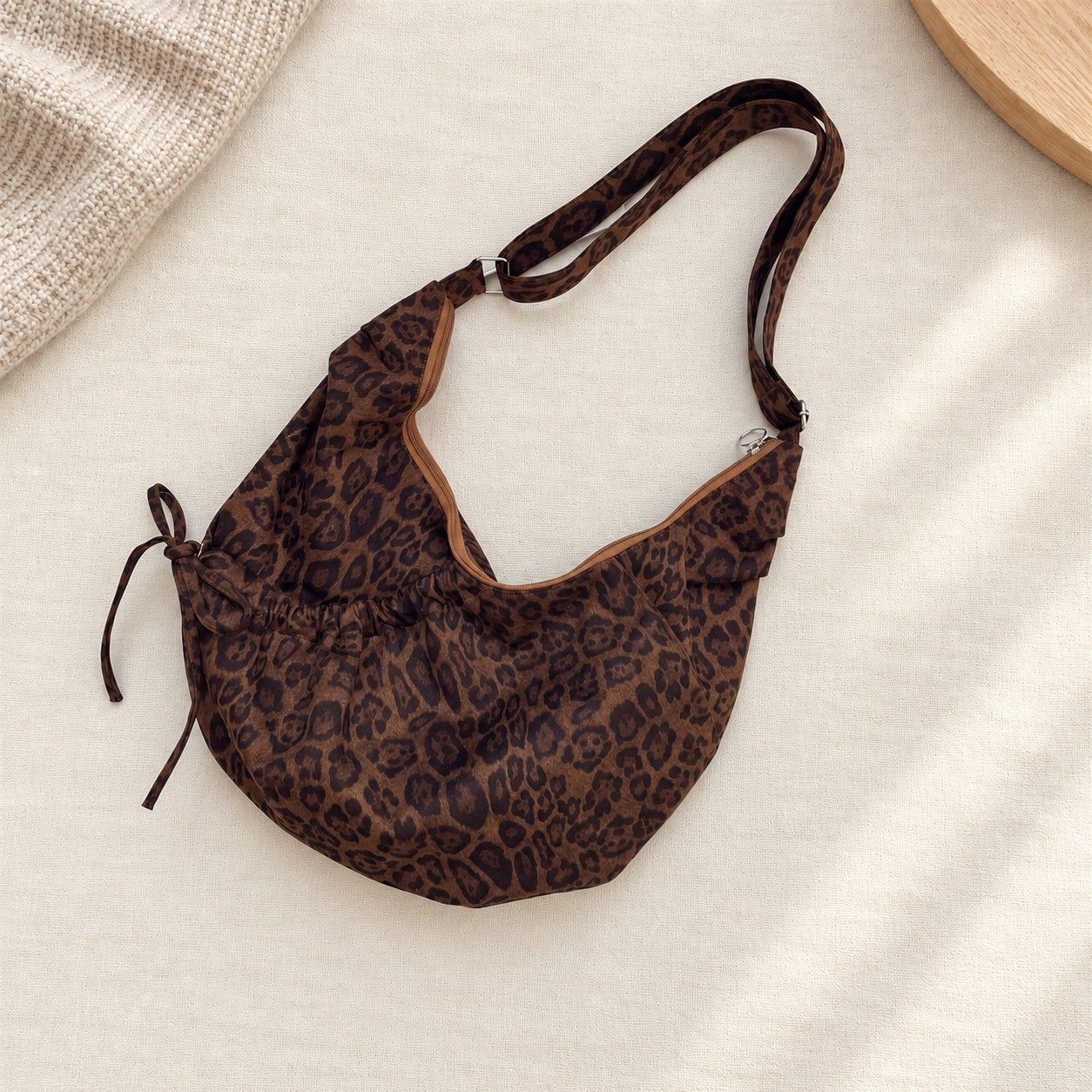 Leopard Print Suede Look Crescent Hobo Shoulder Bag with Zip Closure and Exterior Pocket
