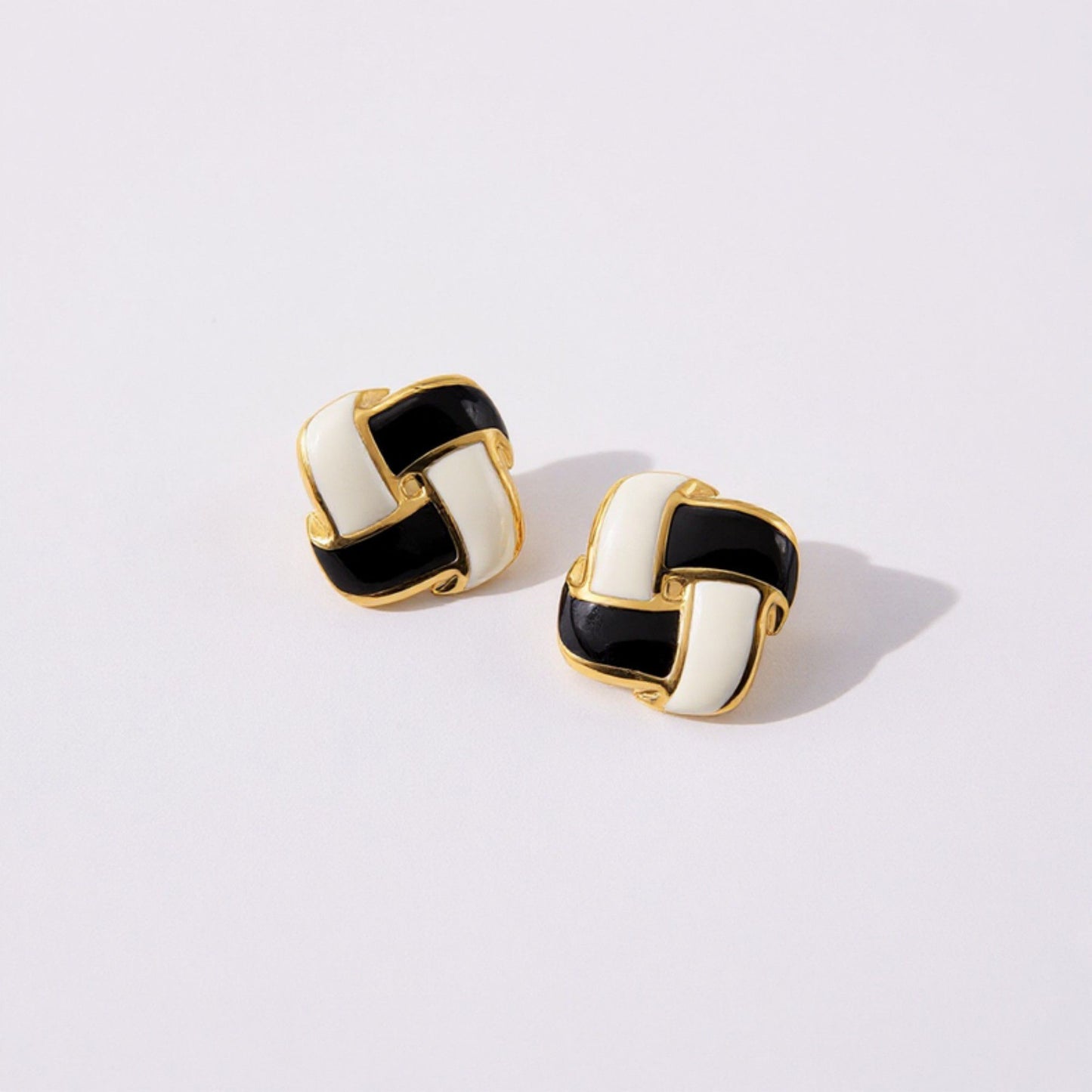 Women's Interlocking Enamel Square Stud Earrings with Gold Tone Frame and Classic Two-Tone Design