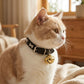 Adjustable Dog & Cat Collar with Paw Print Decoration and Bell Soft PU Leather