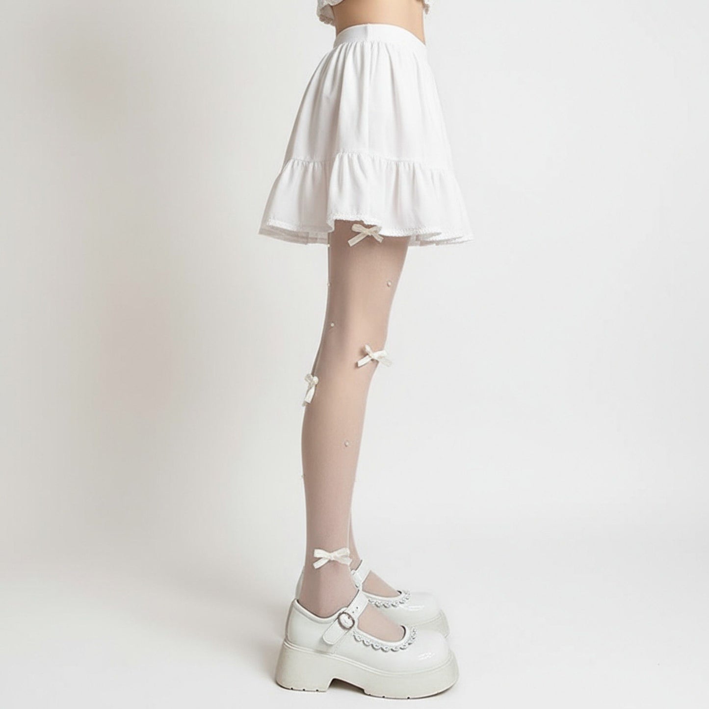 Sheer Tights with Bow Accents and Polka Dot Embellishments