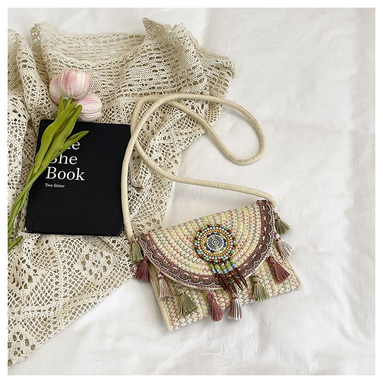 Women's Woven Crossbody Bag with Beaded Medallion Tassel Flap and Long Strap