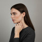 Women's Wavy Band Ring with Delicate Sparkling Accents and Sleek Polished Metal Design