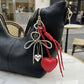 Heart Bag Charm Keychain with Beaded Bow Accent Clip and Faux Leather Heart Pendant