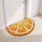 Kiwi Fruit Slice Plush Semicircle Bathroom Mat with Green Tufted Design