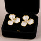 Women's Floral Stud Earrings with Gold Trim, Iridescent Petal Details and Sparkling Center Gemstone Accents for Elegant Style