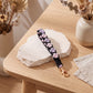 Floral Braided Wrist Strap with Swivel Clasp