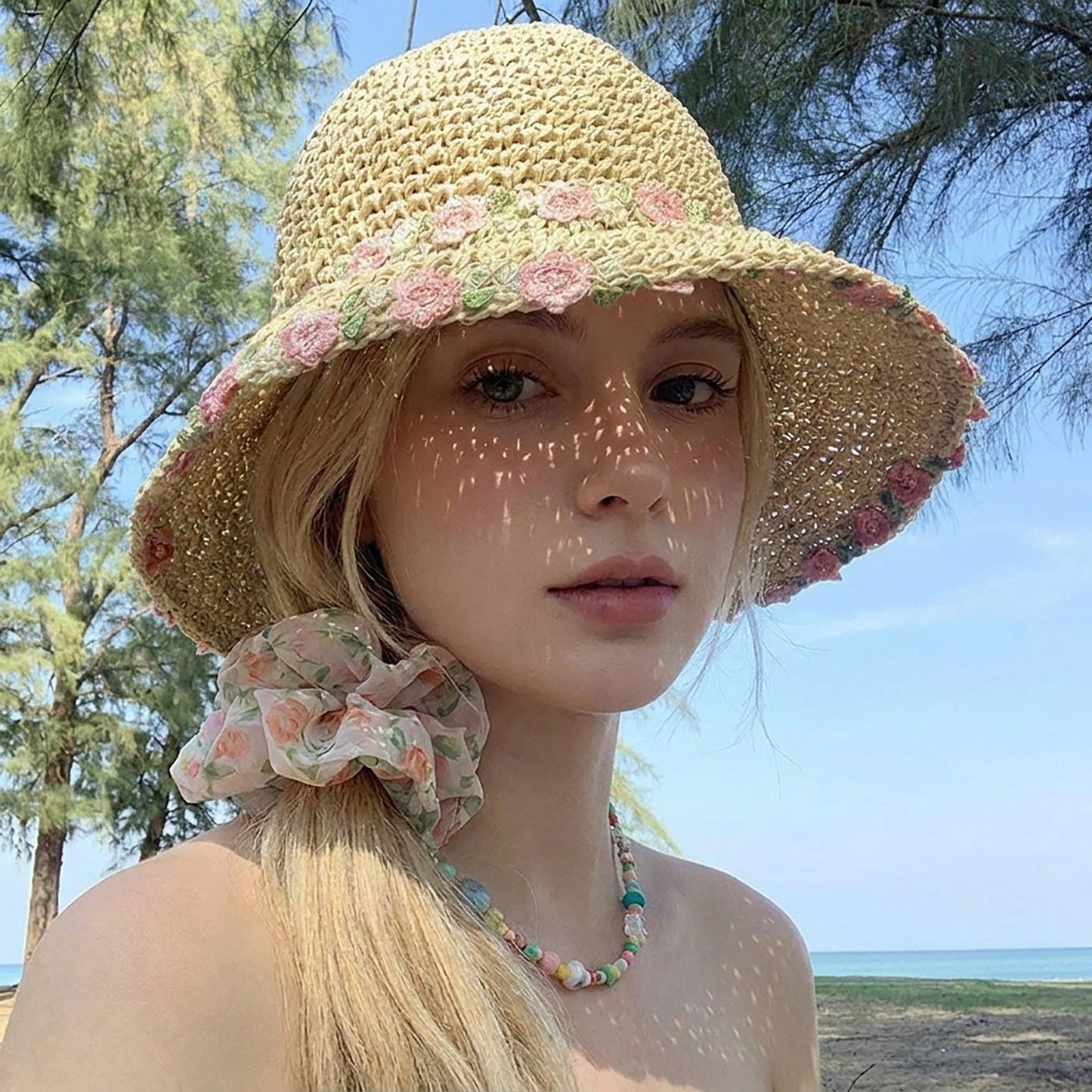 Crochet Bucket Sun Hat with Floral Embroidery and Wavy Brim Design