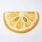 Kiwi Fruit Slice Plush Semicircle Bathroom Mat with Green Tufted Design
