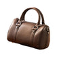 Structured Leather Barrel Satchel with Top Handles Compact Cylinder Shape and Crossbody Option