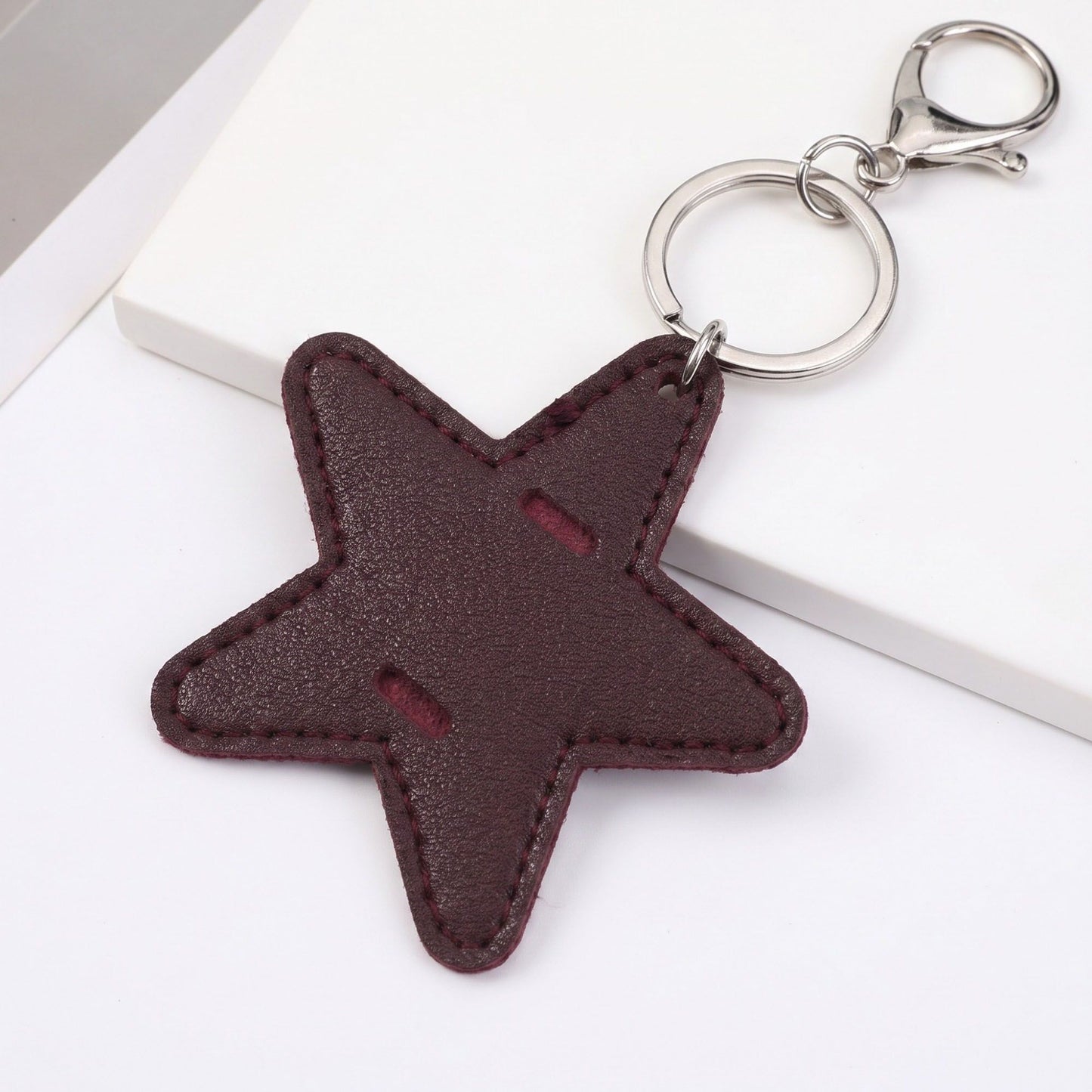 2-Piece Womens Faux Leather Bag Charm Keychain with Metal Clip Ring and Stitched Detail