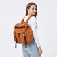 Flap Drawstring Backpack with Dual Buckle Straps and Zippered Side Pockets