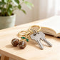 2 Pack Sports Ball Cherry Keychains with Gold Tone Clip and Leaf Charm