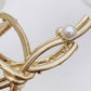 Bow Shaped Hair Clip with Faux Pearl Accent and Open Frame Design 4.5x1in
