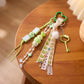 Multi-Element Bag Charm with Hanging Strap and Decorative Accents