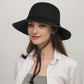 Wide Brim Straw Sun Hat with Chin Strap and Black Cord Detail for Outdoor Protection and Stylish Shade