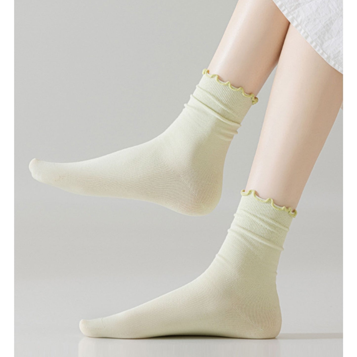 4 Pairs Women's Ruffle Edge Crew Socks Soft Stretch Cotton Blend with High Elastic Cuffs in Assorted Solid Colors