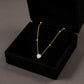 Women's Dainty Solitaire Pendant Necklace with Gold Tone Chain and Delicate Bezel-Set Crystal Accents