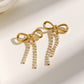 Bow Drop Earrings with Rhinestone Dangle Detail Feminine Statement Jewelry