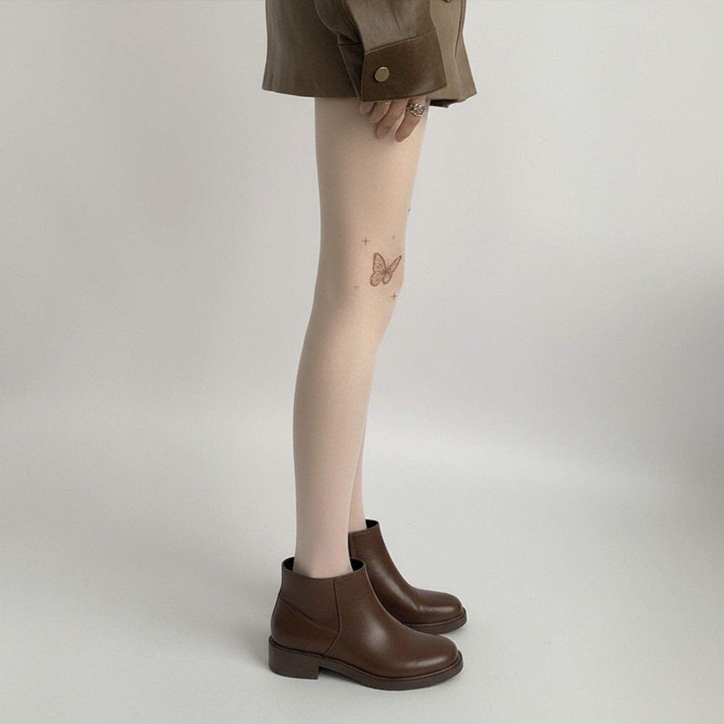 Sheer Butterfly Print Tights with Subtle Sparkle Star Accents and Stretch Fit