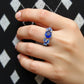 Women's Oval Gemstone Ring with Crystal Butterfly Accents and Floral Design