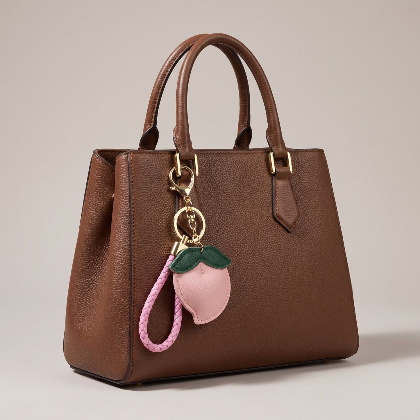 Peach Bag Charm with Braided Leather Loop and Gold Tone Hardware