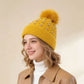 Knit Beanie with Large Faux Fur Pom-Pom - Winter Hat with Embroidered Accents