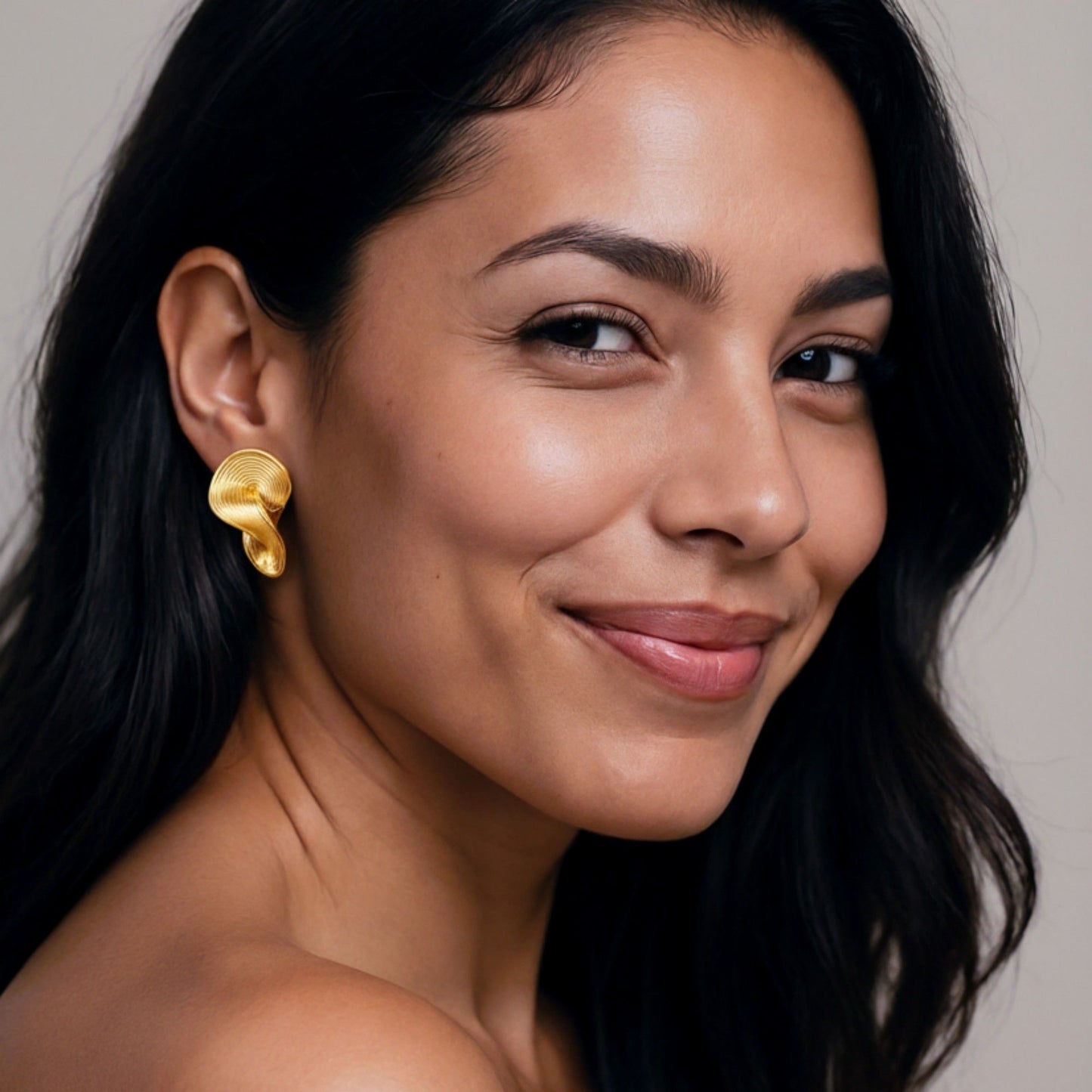 Women's Sculptural Gold Tone Statement Earrings with Modern Layered Swirl Design