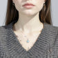 Women's Star Flower Pendant Necklace with Crystal Center Stone and Accent Gem Detailing