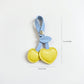 2-Piece Womens Padded Bag Charm with Hanging Strap and Stitched Detail