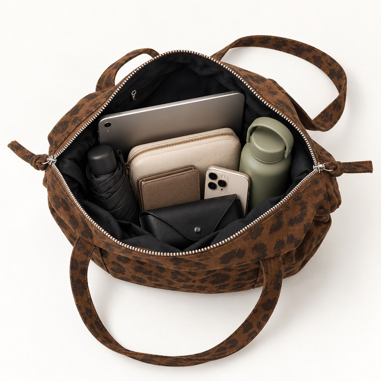 Leopard Print Barrel Shoulder Bag with Zip Closure and Interior Pockets