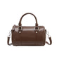 Structured Leather Barrel Satchel with Top Handles Compact Cylinder Shape and Crossbody Option