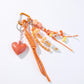 2-Piece Womens Bag Charm with Hanging Strap and Decorative Accents