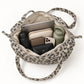 Leopard Print Barrel Shoulder Bag with Zip Closure and Interior Pockets