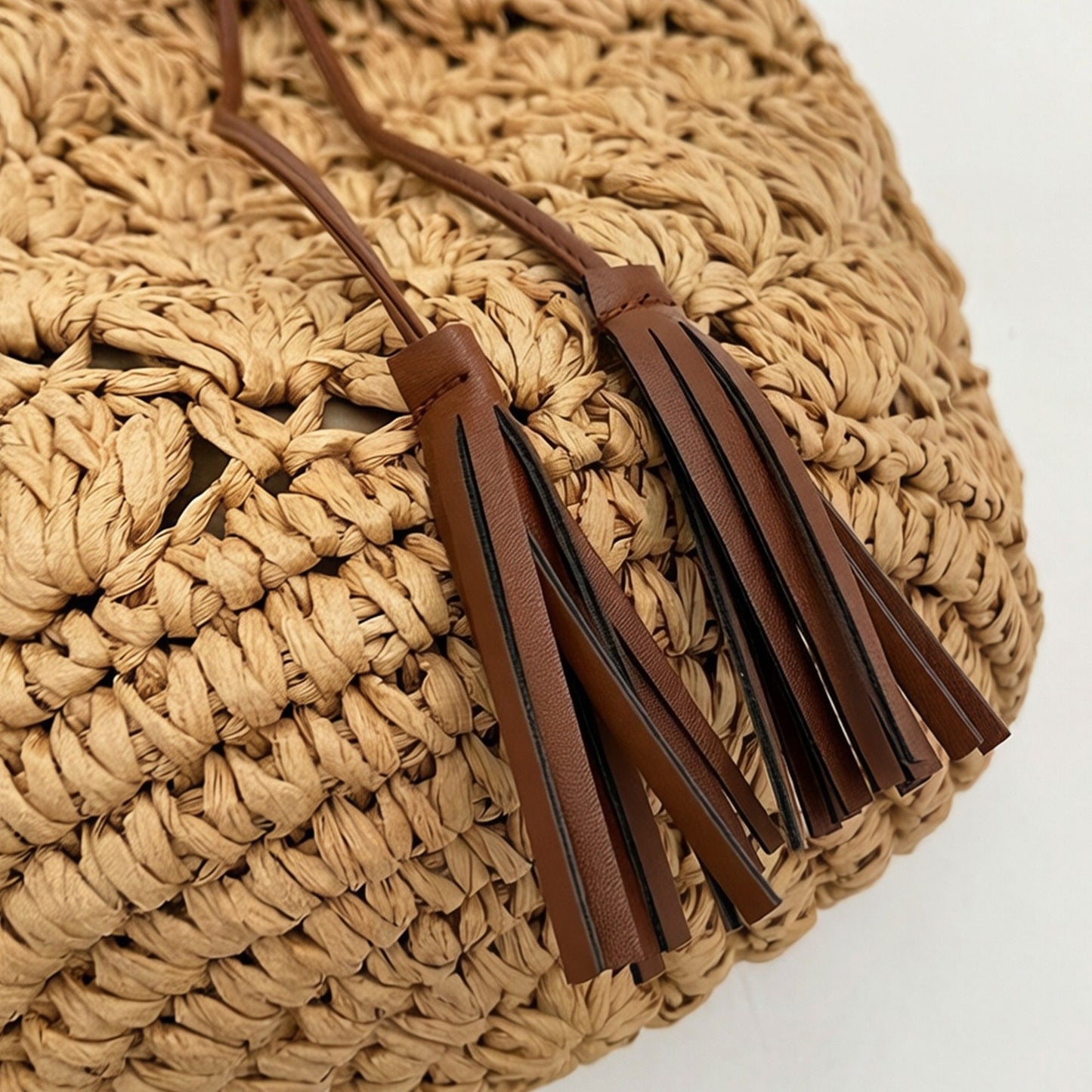 Woven Bucket Shoulder Bag with Drawstring Closure Faux Leather Strap Tassel Detail Lightweight Handbag