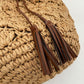 Woven Bucket Shoulder Bag with Drawstring Closure Faux Leather Strap Tassel Detail Lightweight Handbag