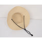 Wide Brim Straw Sun Hat with Chin Strap and Black Cord Detail for Outdoor Protection and Stylish Shade