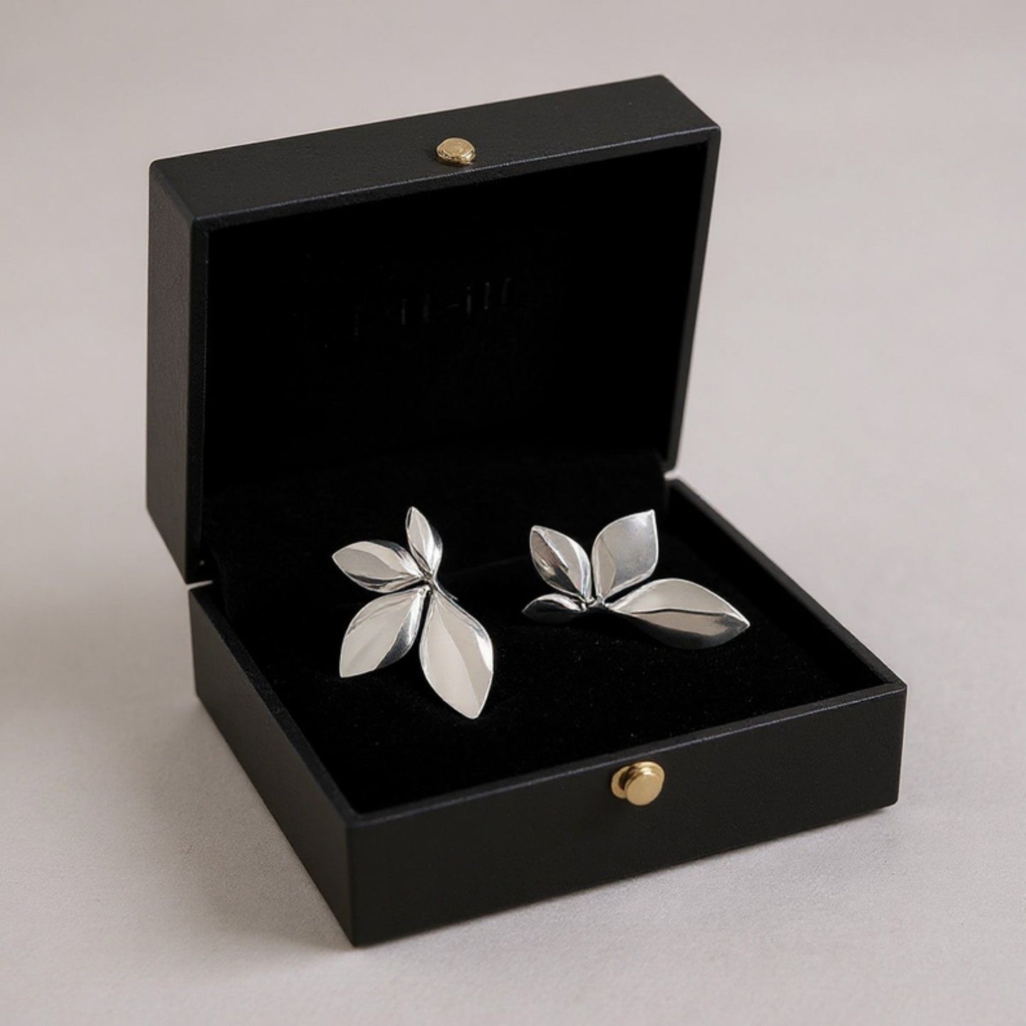 Women's Sculpted Leaf Drop Earrings with Polished Layered Petal Design and Bold Modern Silhouette for Statement Style