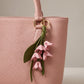 Floral Bag Charm with Tassel Strap and Gold Tone Ring