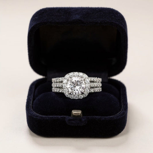 Women's Cushion Halo Engagement Ring with Round Cut Center Stone and Triple Band Design