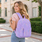 Quilted Backpack with Embroidered Pattern and Multiple Pockets