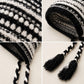 Patterned Knit Beanie with Braided Tassels
