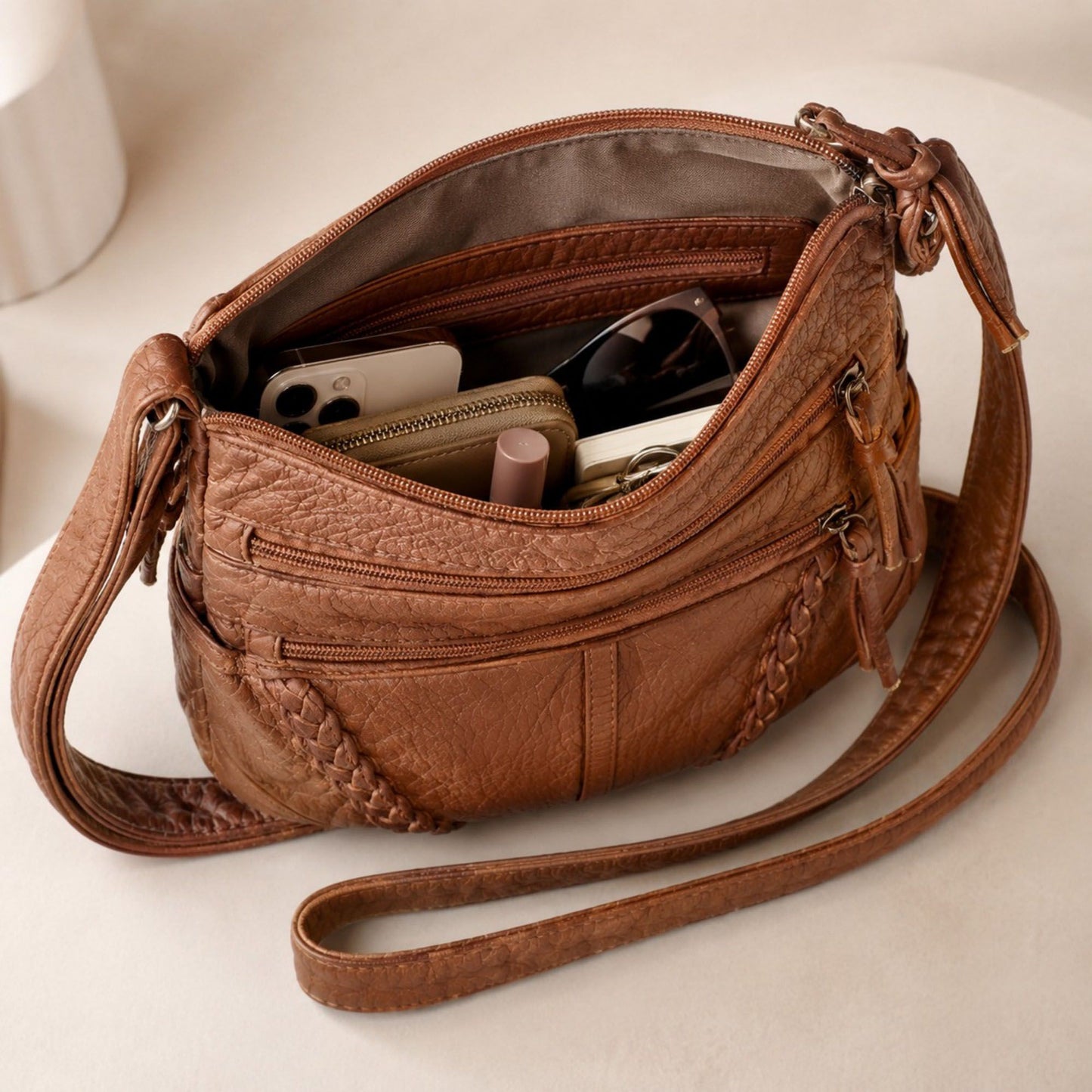 Multi-Pocket Crossbody Bag with Adjustable Strap and Braided Trim