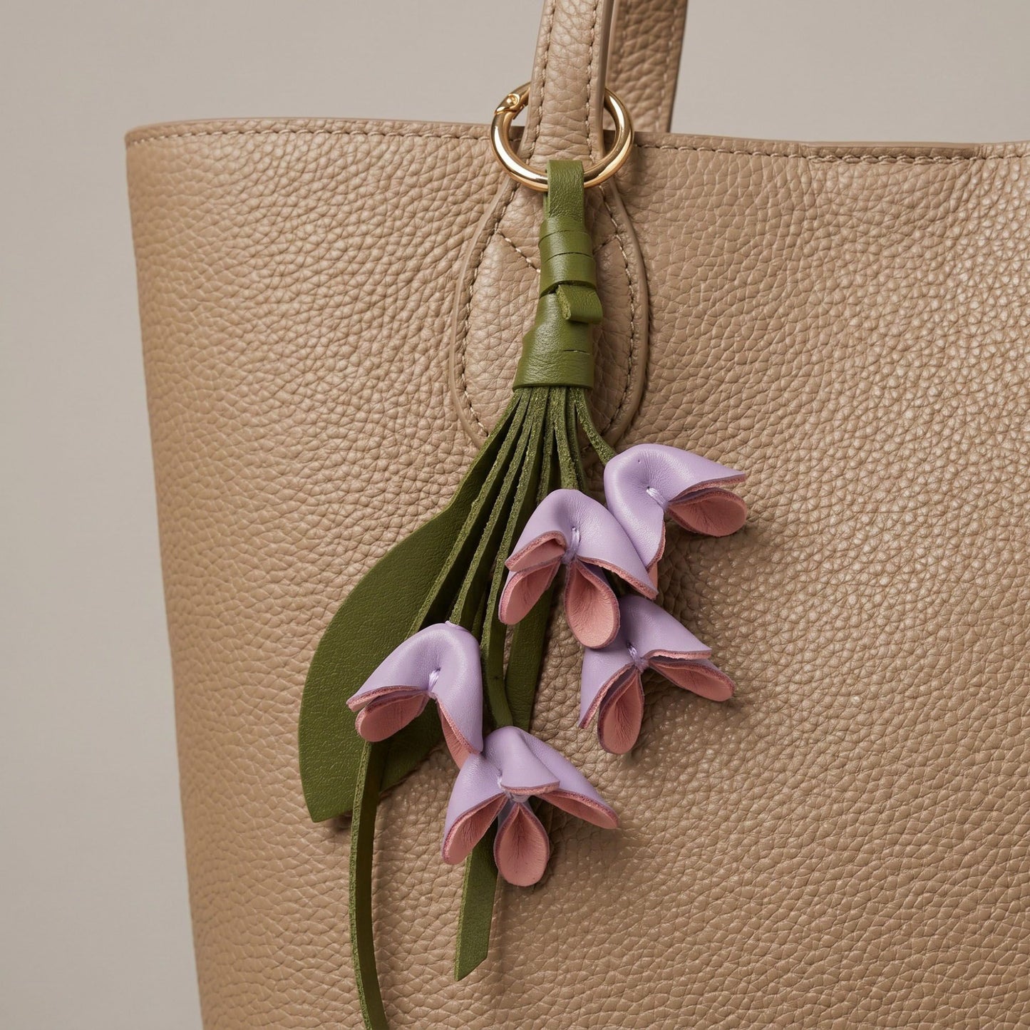 Floral Bag Charm with Tassel Strap and Gold Tone Ring
