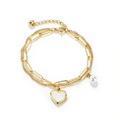 Double Layer Chain Bracelet with Heart Charm Pendant and Smooth Bead Drop Detail for a Delicate Feminine Layered Look