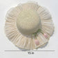 Wide Brim Straw Sun Hat with Pleated Sheer Brim Bow Accent and Floral Trim