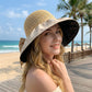 Wide Brim Crochet Sun Hat with Bow Accent and Textured Fabric Brim
