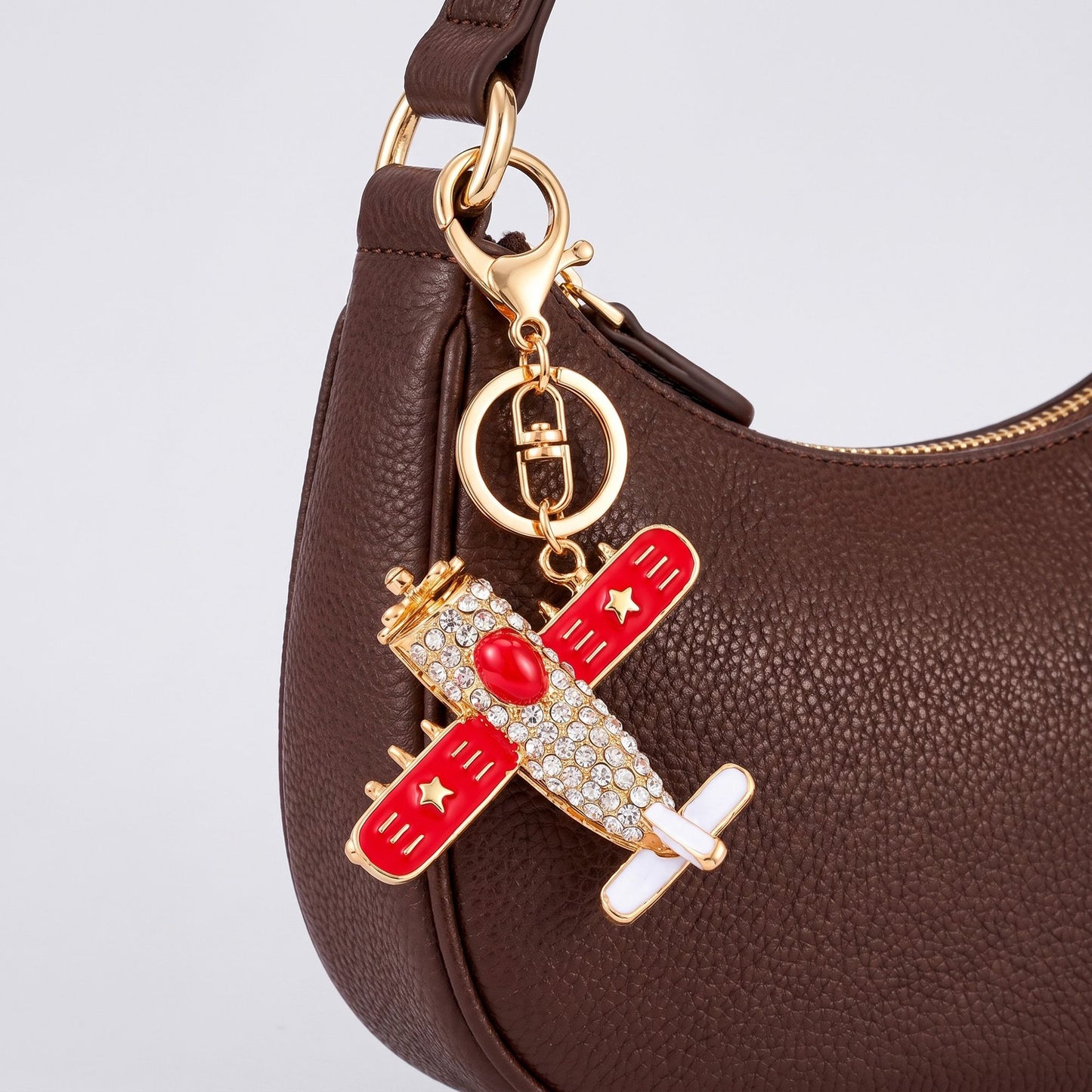 Airplane Rhinestone Keychain Bag Charm with Gold Tone Clasp and Key Ring